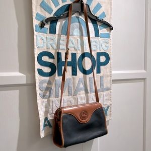 Dooney & Bourke Black and Tan leather crossbody Bag